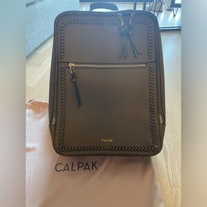 Like new Calpak 15” Kaya laptop backpack in olive green.